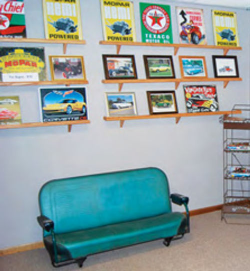 andthe seatinthis auto art gallery is from a vintage Chevy Blazer.