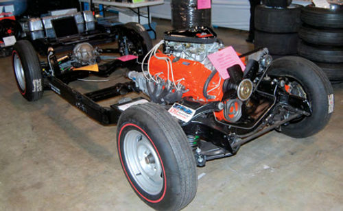 Even the fiberglass Corvette has a metal frame that needs to be refinished.