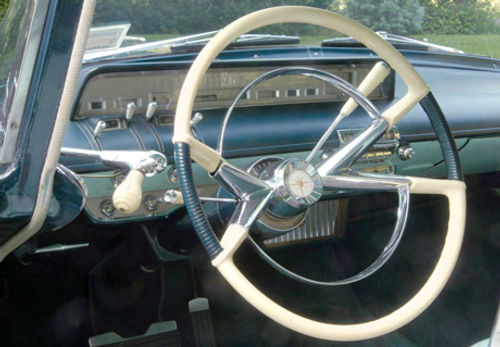 There’s a bit of the future in that dashboard and to Ford’s credit, it’s only a bit. Note the dished steering wheel, a safety feature added by Ford for 1956.