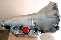 Photo 1. A GM 200R4 Overdrive Transmission (left). In spite of an early reputation for failures, the 200R4 is a stout transmission and can be built to be very strong and reliable.