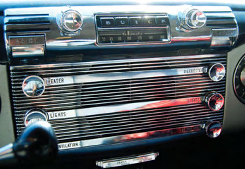 The radio has power coming to it but doesn’t play. The slight color variation on the glove box door reportedly is “the way it came from the factory.”