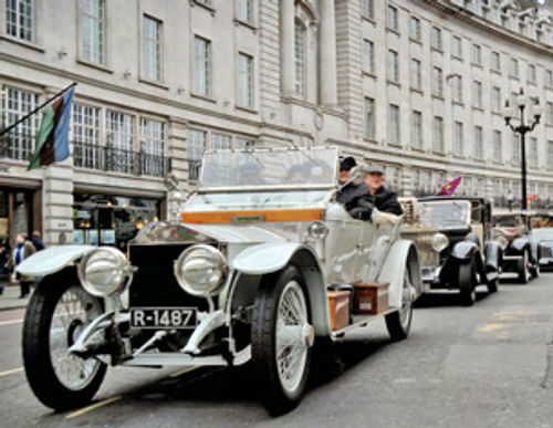 A cruise given in honor of the 100th anniversary of the Rolls-Royce Spirit of Ecstasy hood ornament included vintage Rolls vehicles on the streets of London