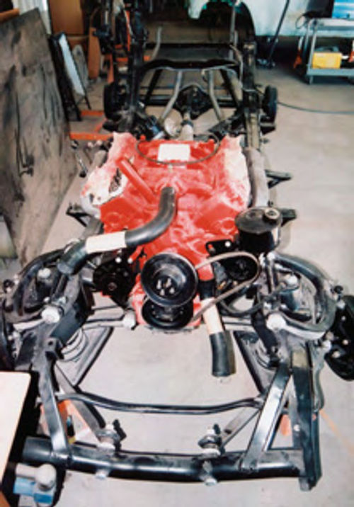 Photo 2. The frame, suspension and drive train are the first parts of the car to go through the restoration process.