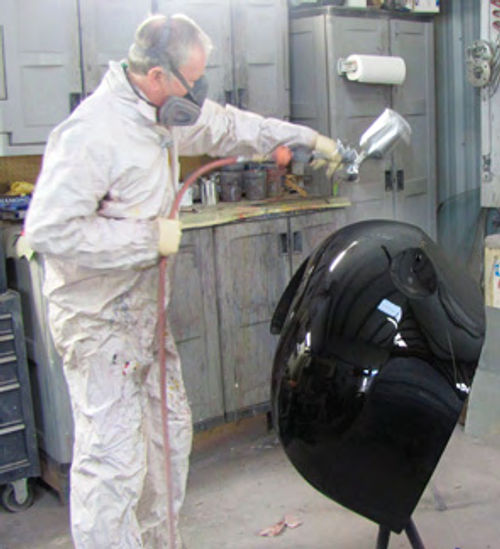 The author at work in his shop with a DeVilbiss Tekna HVLP gun.