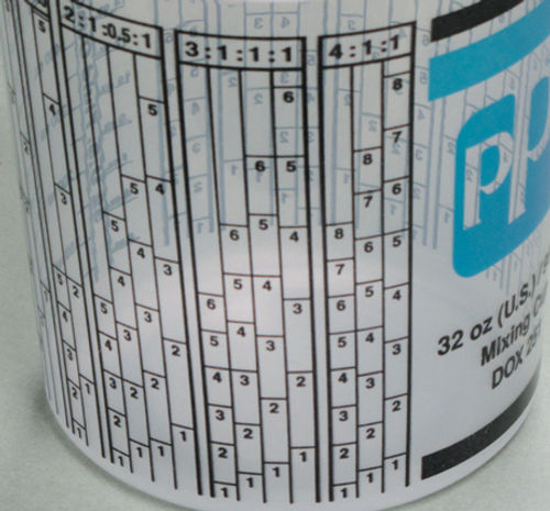 Photo 2. Mixing cups are marked with several different mixing ratios like the 3:1:1:1 and the 4:1:1 visible here.