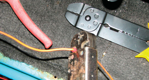 Photo 8. In some instances, damaged wire can be cut out and then replaced with new wire using solderless (crimped) connections.