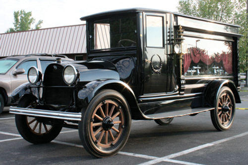 The oldest motorized hearse at last year’s Professional Car Society meet was this 1919 Reo Speed Wagon. Note how the ornate carriage lamps are nearly as tall as the doors.