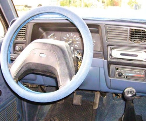 When the seats wore out after about 15 years of use, he covered them. The steering wheel and dash covers are signs of a vehicle that lives in the high desert and must endure some intense sunlight and heat for much of the year.