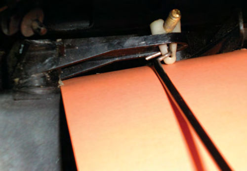Photo 2. A piece of welding rod was connected to the lever and extended into the glove box as a temporary fix.