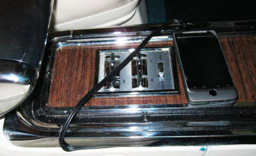 Photo 7. The audio wire from the RediRad was run beneath the factory trim to keep it hidden until it was ready to pass up onto the console. This way it can also be tucked between the seat and console if you wish to hide the wire when you’re not using it.