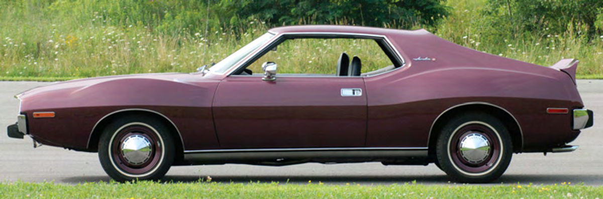 In profile, it’s easy to see that the Javelin has one of the basic requirements for a pony car, the combination of a long hood and a short deck. It’s also easy to see the unusual bulges atop the fenders.