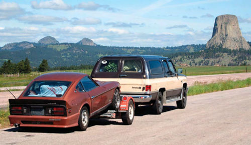 The 280Z gets a cross-country lift from the Suburban on its way to its new home in Pennsylvania. That’s the Devil’s Tower in Wyoming in the distance.