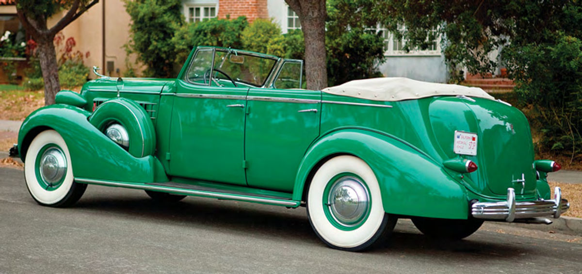 With the exception of the Model 60s, all Cadillac V-8s were fitted with bodies by Fleetwood which had a policy of offering special-order cars in any color the buyer chose. This car is Scarab Green, which was a standard color in the Model 60 line.