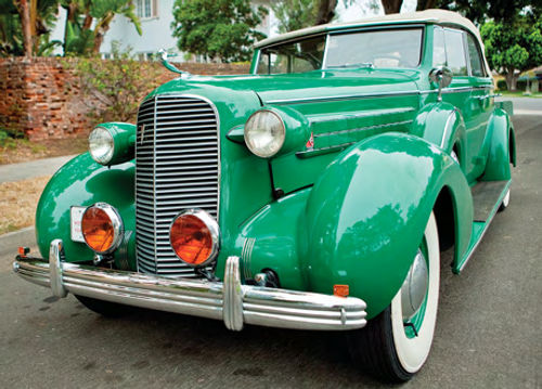 Mounting of the headlights on the radiator shell rather than fender-mounted distinguishes the ’36 from earlier Cadillacs. Calman got the amber fog lamps from a previous owner of the car.