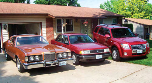 Evidence that a true Mercury family lives here. From left to right are their ’75 Cougar, a 1991 Topaz and the newest addition, a 2008 Mariner.