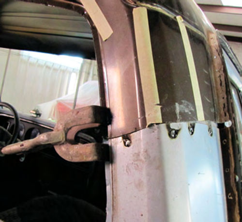 Photo 9. The rear of the cab also is gusseted prior to welding.