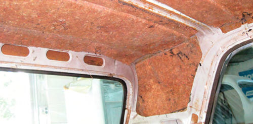 Once you’ve removed all your attaching points you can take the bows out and remove your old material all as one assembly. Note the hook above the back window in this picture...these hooks are the foundation for your headliner.