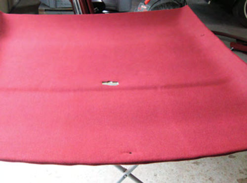 After cutting out any necessary holes, your new headliner board will be ready for re-installation..