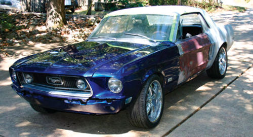 The ’68 Mustang during various stages of the restoration project.