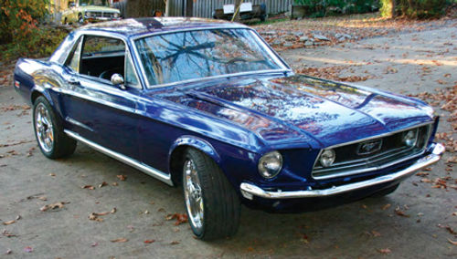 The ’68 Mustang during various stages of the restoration project.