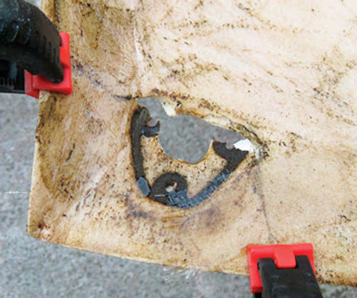 Any broken pieces can be clamped back in place and repaired using fiberglass matting on both the front and back.