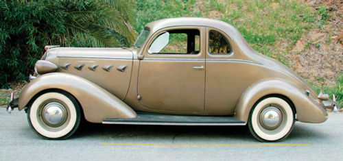 Though its top seems a little tall, the coupe still is an elegant vehicle. Note the hood ornament here and on page 9. The three cavaliers represent the Graham brothers who founded the company.