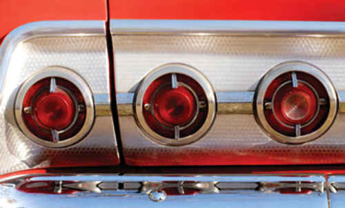 Small round taillights—three per side on an Impala—were a signature Chevy feature through much of the 1960s.