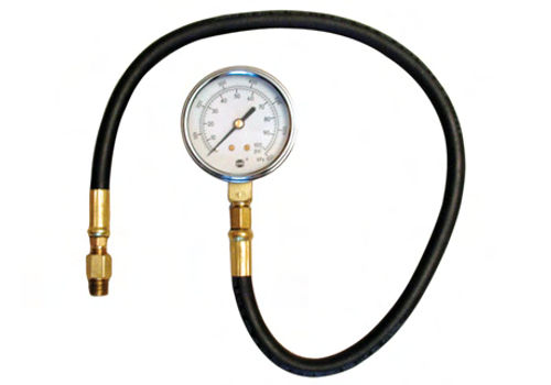 An external oil pressure gauge. It replaces the oil pressure sender to check pressure readings.