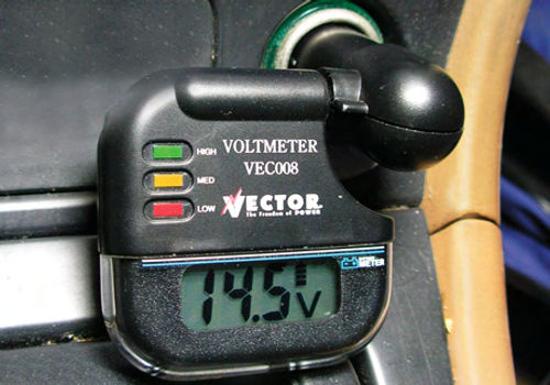 An inexpensive aftermarket voltmeter that plugs into a cigarette lighter receptacle. It supplies a lot more information than a warning light.