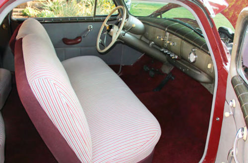 The front seat on this Ambassador offers living-room comfort for the long hours spent on a trip…