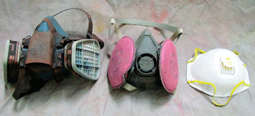 Photo 5. From left to right. 3M half-face painting respirator #7178, 3M half-face welder’s respirator #7182, and a 3M NIOSH-approved dust mask #7185.