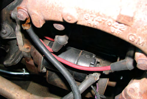 Photo 12. Exhaust manifolds are not a good place to connect a ground strap because of heating cycles and rust. Connecting the ground strap to the cylinder head, block, transmission case or intake manifold is a better choice.