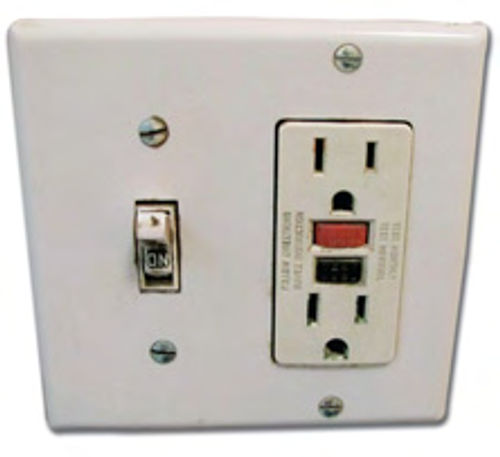 Photo 3. All GFI (Ground Fault Interrupter) electrical outlets have the red and black buttons at the center of the unit. If you don’t see the buttons, the outlet isn’t safe to use in the shop where water is present.