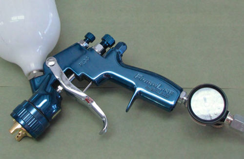 Photo 3. The DeVilbiss Finishline 4, Eastwood #12826, is designed and constructed with water- borne paints in mind. This gun comes with a plastic cup and gauged regulator.