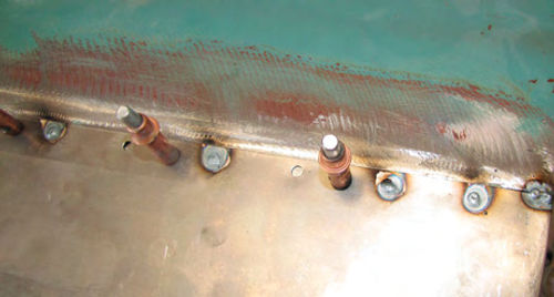 Photo 7. Skipping spot weld holes allows the panels to stay cooler as I weld. That reduces warping.