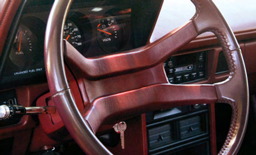 The steering wheel is well-positioned and the gauges are easily read.
