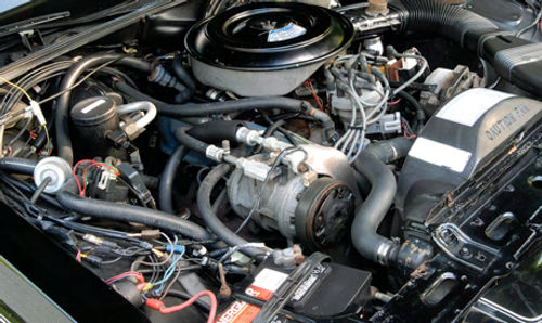 It was a sign of the times that engine compartments in the mid-1980s were rapidly becoming full. Look carefully and it’s possible to see the V-8 under all of the wiring, plumbing and components.