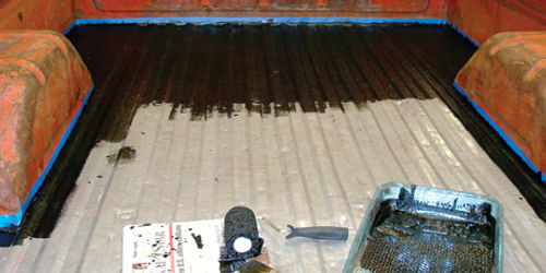 Photo 24. Although it was tedious work applying Herculiner with just a brush and small roller, the results were worth it: The coating immediately brightened up Ruby’s dented, rust-pitted box floor.