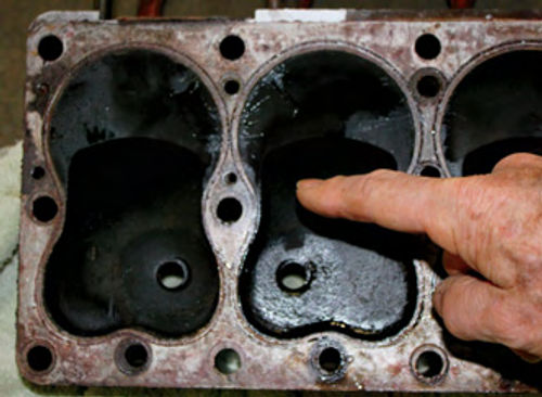 Photo 7. Cylinder Head, Blocked Coolant Passages: Block overheating can be caused by plugged or partially plugged passages.