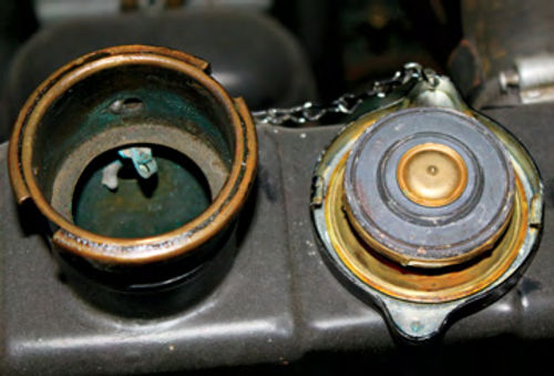 Photo 6. Pressure Radiator Cap: Pressure cap ratings range from 3-18 psi. The higher the pressure, the higher the coolant temperature boiling point.
