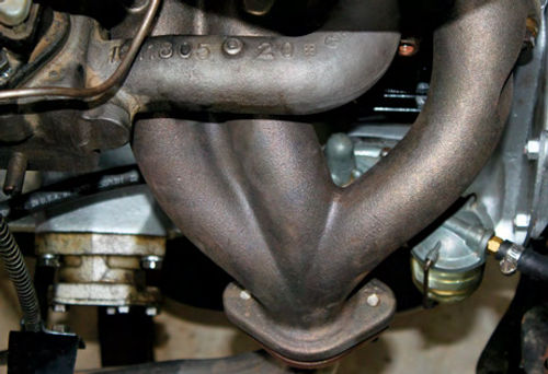 Photo 10. A modification with exhaust headers: This Dodge engine exhaust modification (headers) provides better acceleration than standard exhaust systems.