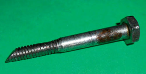 Photo 3. A simple tool was made by doing some grinding on an old 1/4” bolt.