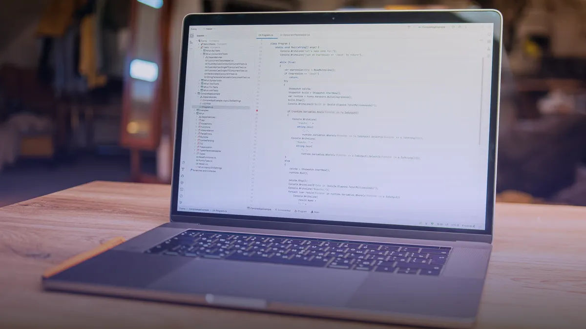 Web developer workspace with design tools and code editor