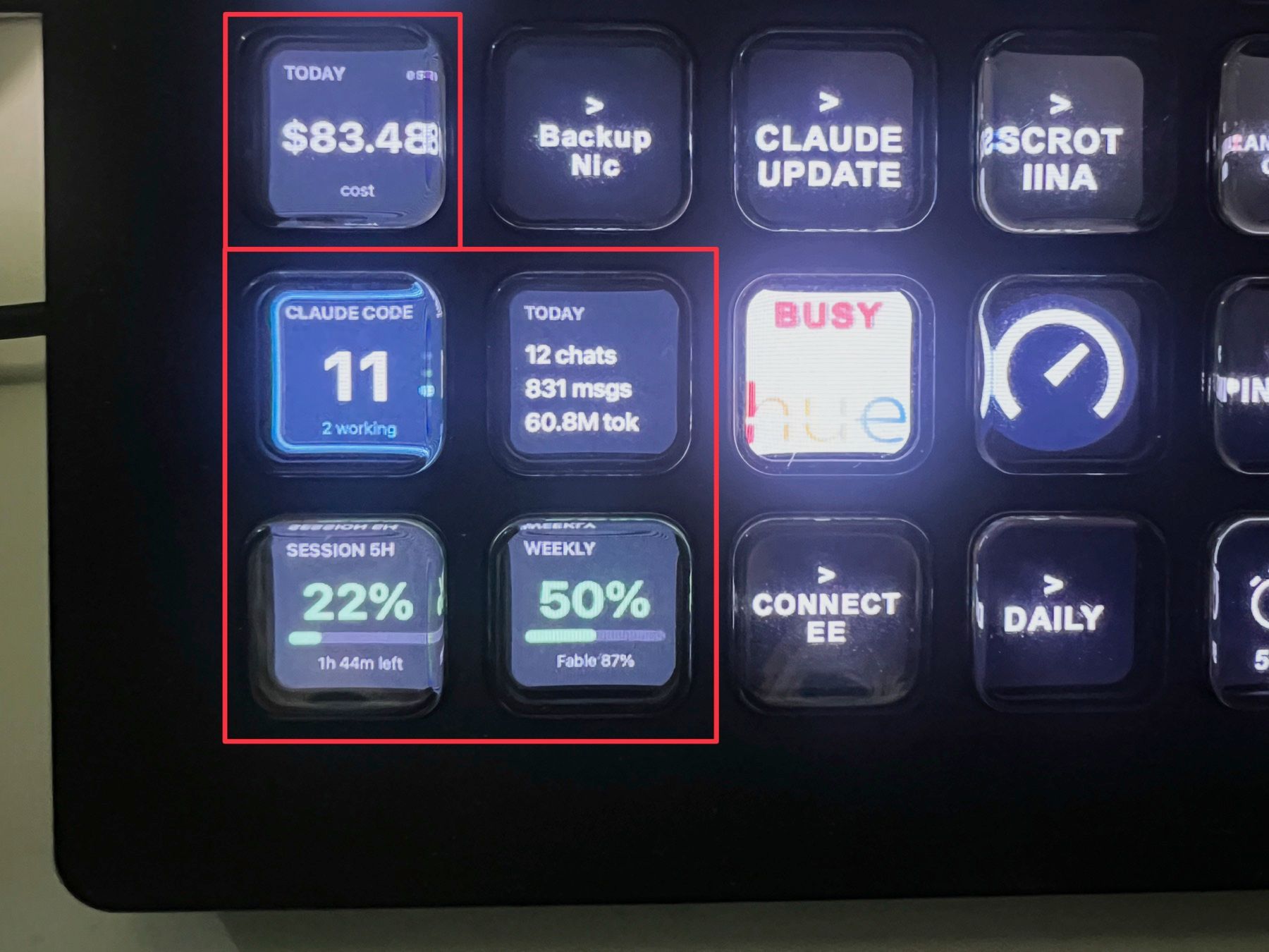 Stream Deck keys running Agent Vitals: daily cost of $83.48, 11 Claude Code sessions with 2 working, 12 chats and 60.8M tokens today, 22% of the 5-hour window and 50% of the weekly limit