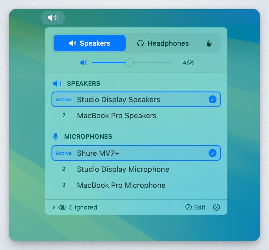The Audio Priority Bar popover on a green desktop: Speakers and Headphones tabs at the top, a volume slider at 46 percent, a ranked speaker list with Studio Display Speakers active, and a separate ranked microphone list with a Shure MV7+ active