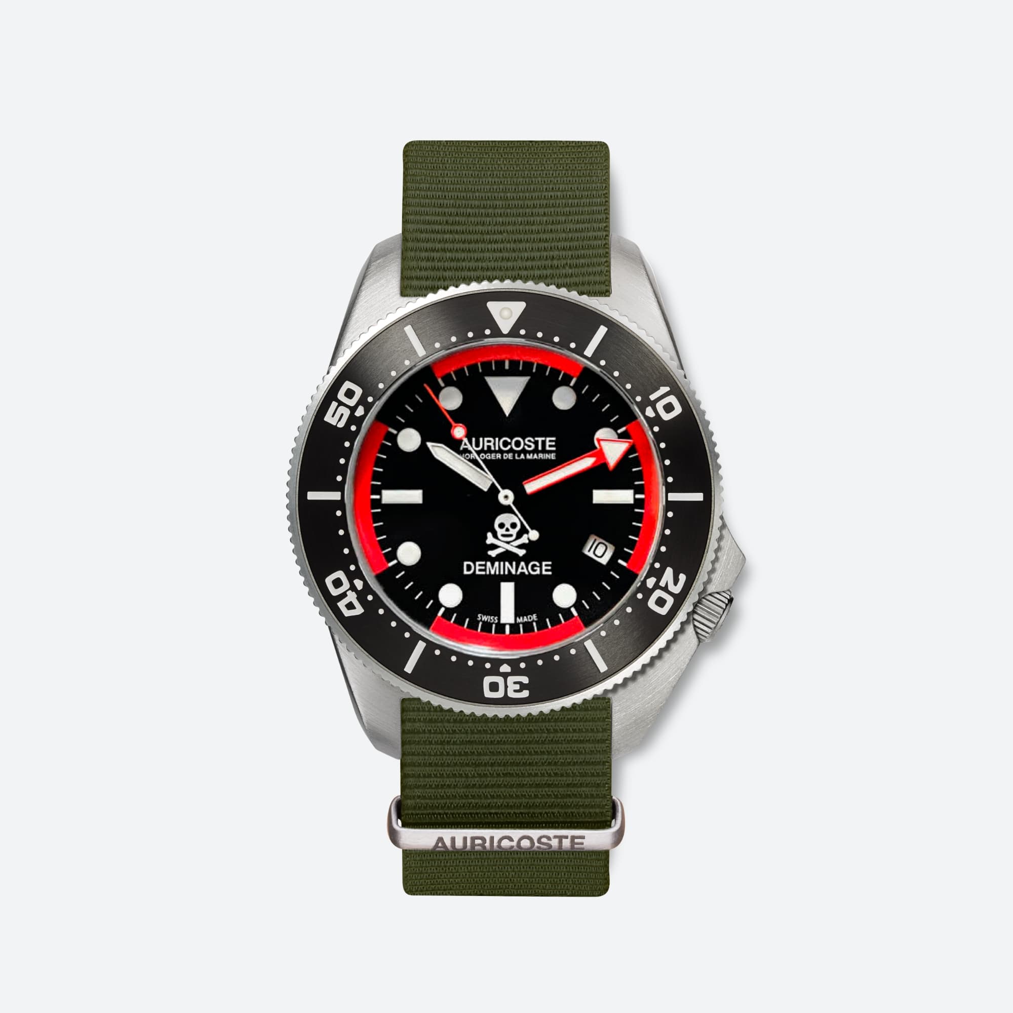Auricoste Deminage dive watch with a black dial, red minute track and skull-and-crossbones logo, on a green NATO strap