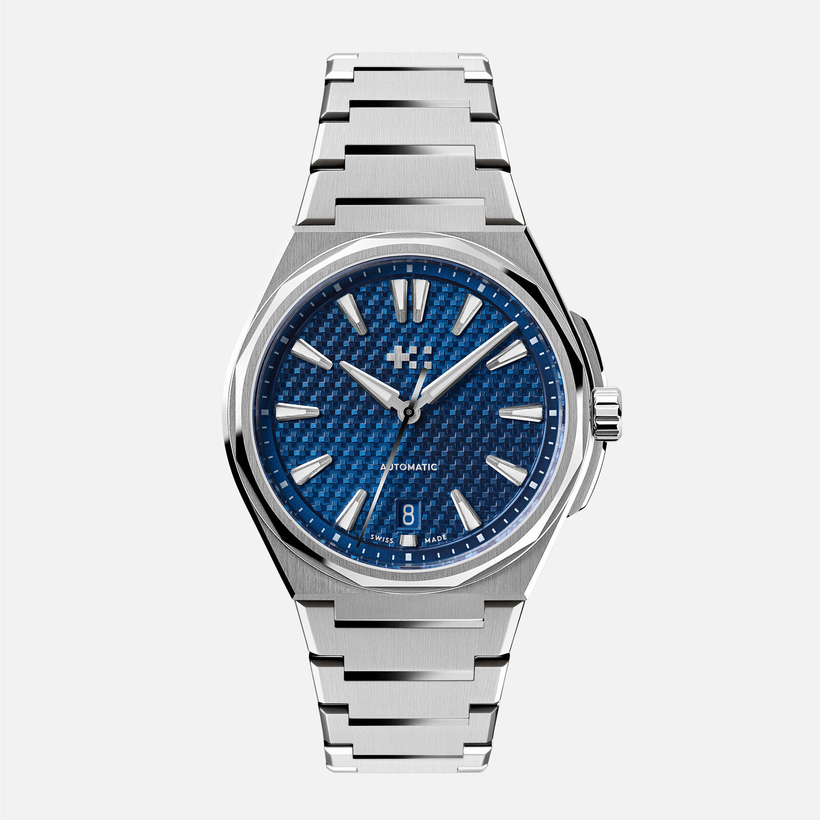 Christopher Ward The Twelve 38 in steel with a Nordic Blue dial: a textured pattern of small pyramids, polished faceted indices, the twin-flags logo at 12, AUTOMATIC under the centre and a colour-matched date at 6, on its integrated tapered bracelet