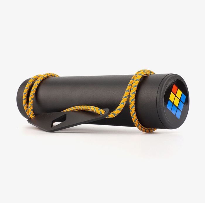 Lattice Heavy Roller, a black cylinder on a yellow cord for rotating grip work