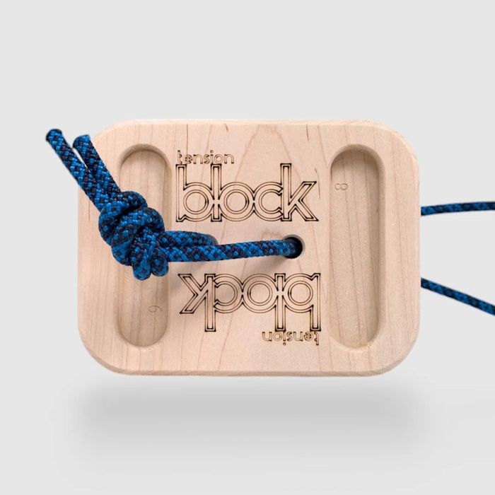 Tension The Block, a shaped maple pinch block with a blue cord threaded through it