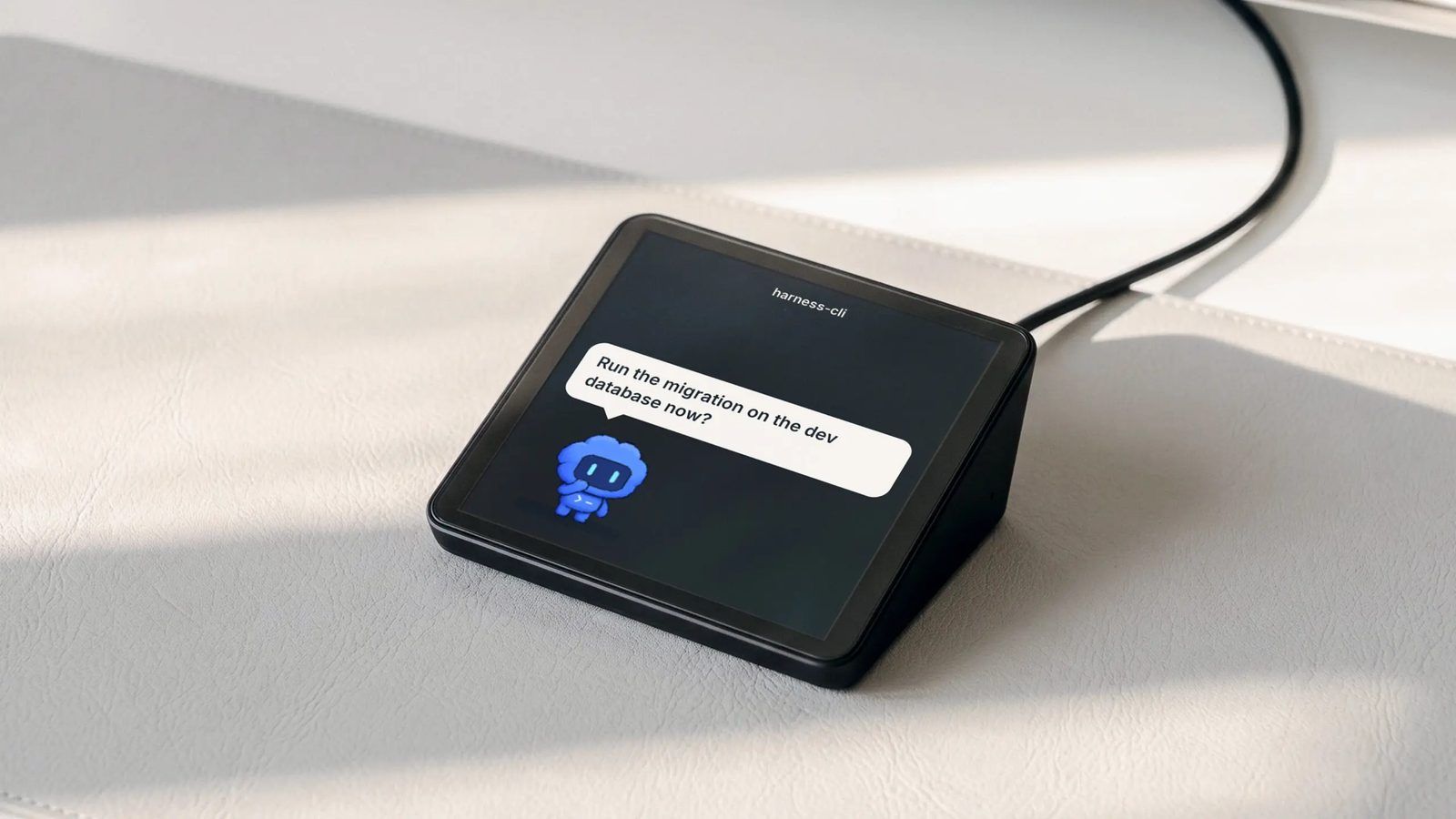 Harness Pro screen for the agent harness-cli, a speech bubble asking Run the migration on the dev database now? above a small blue robot pet